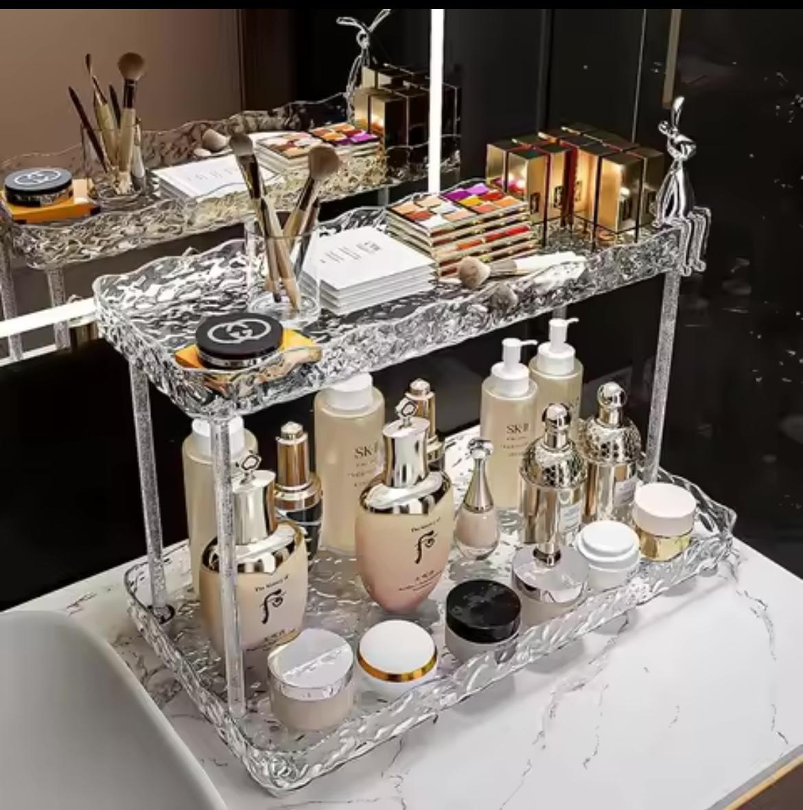 Two tier crystal-like makeup organizer.