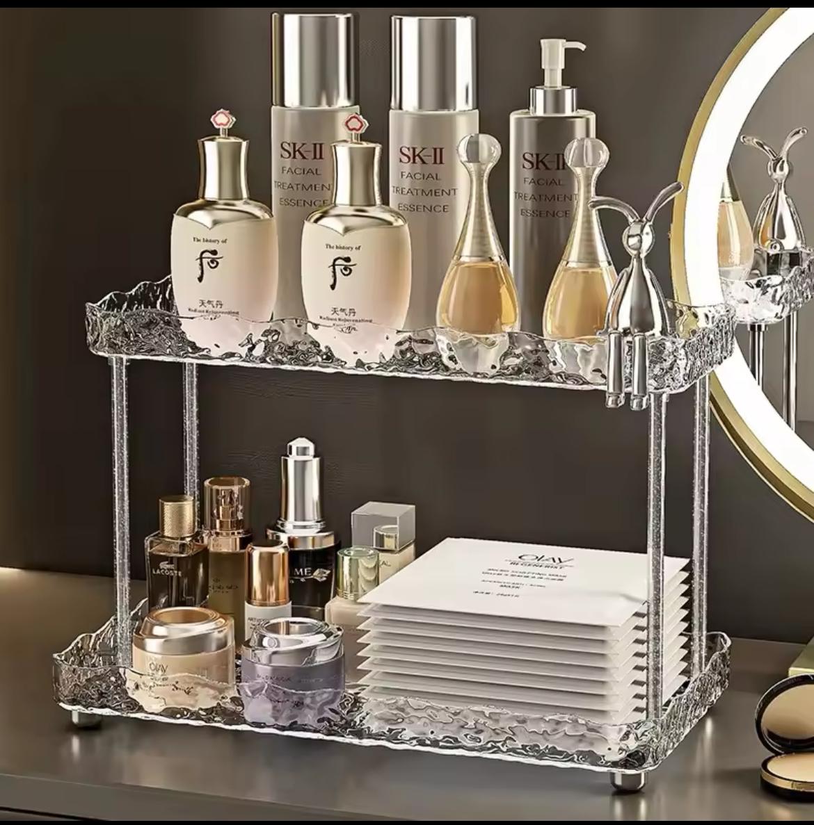 Two tier crystal-like makeup organizer.