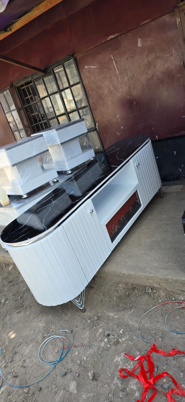 Tv stand with fire place.