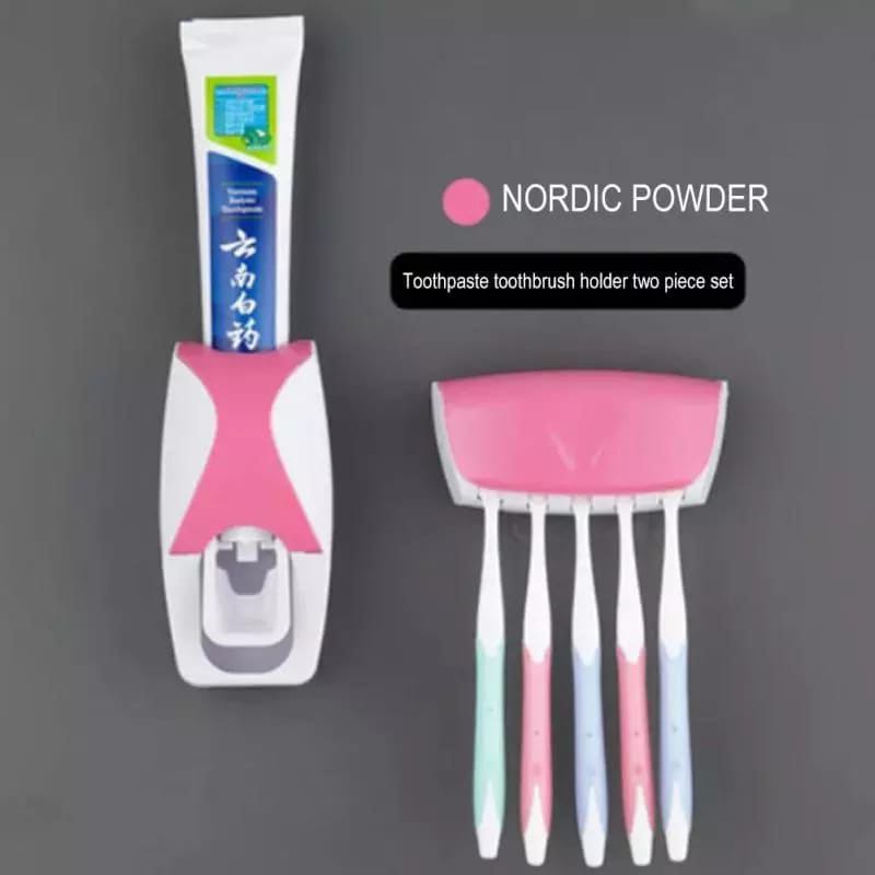 Toothpaste dispenser with toothbrush holder