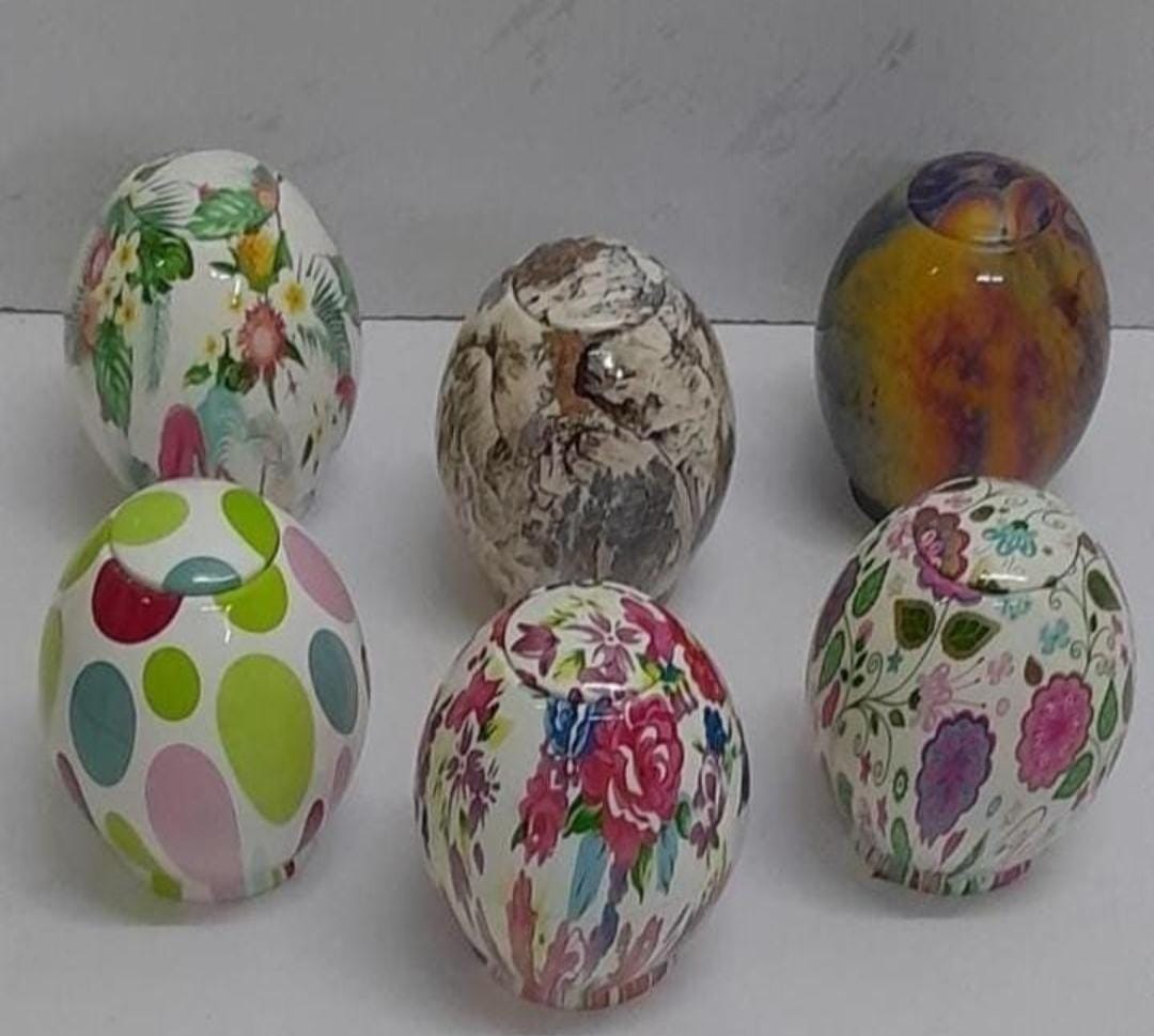 Egg-shaped toothpick dispenser