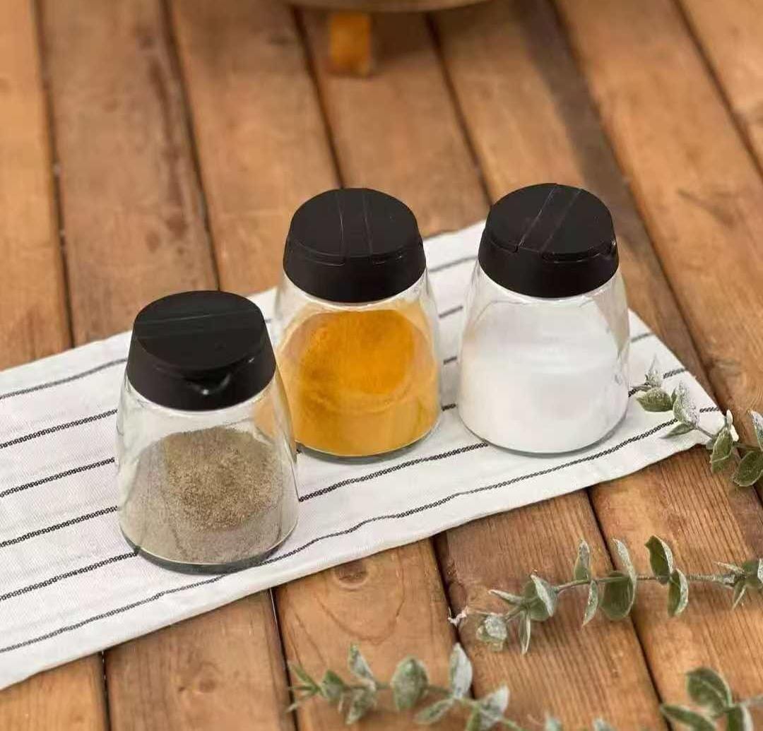 Glass salt shakers With black lid