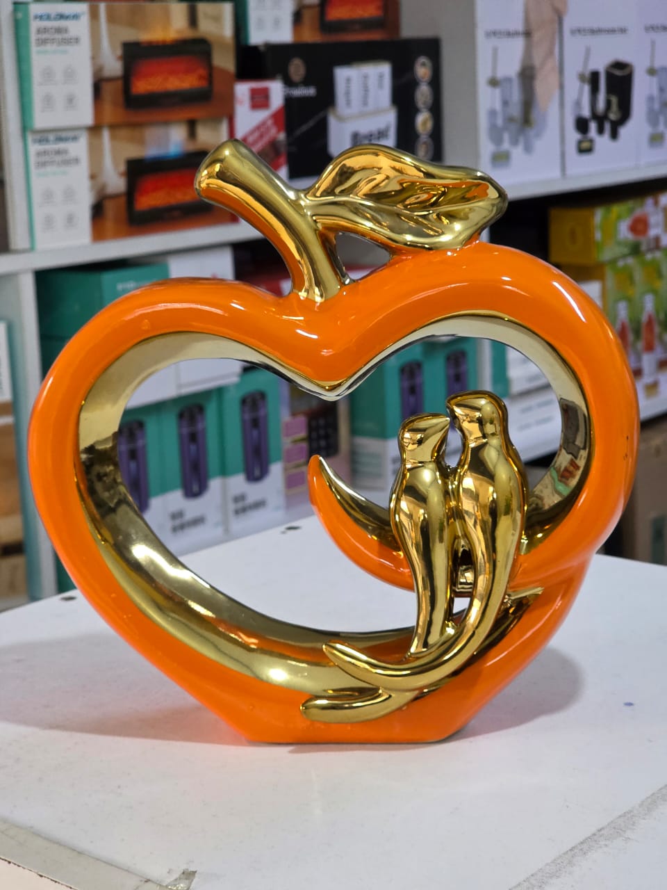 Ceramic hollow crafts Apple golden bird simulation