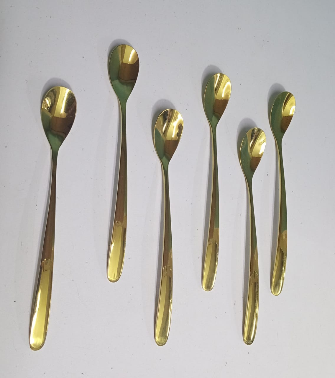 Gold tea spoon shapely