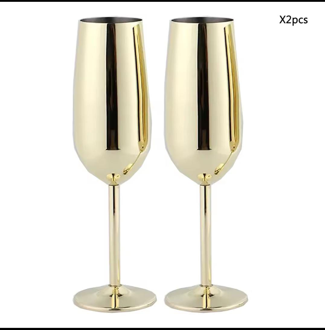 A pair of Gold Stainless steel wine glass