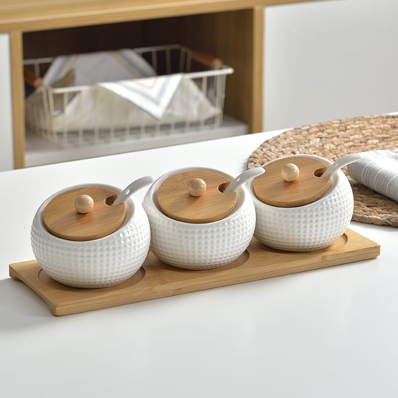 Golf themed ceramic condiment set with bamboo stand
