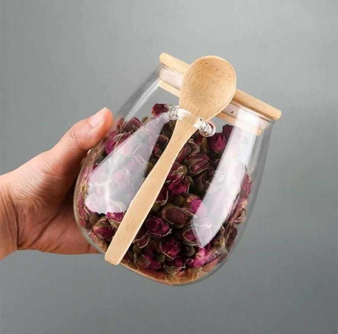 Glass storage canisters with Bamboo spoon and airtight lid.