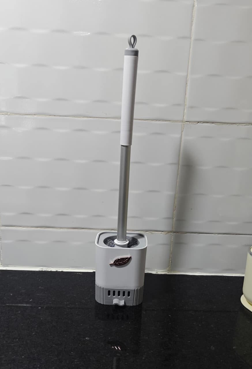 Wall mounted toilet brush cleaner
