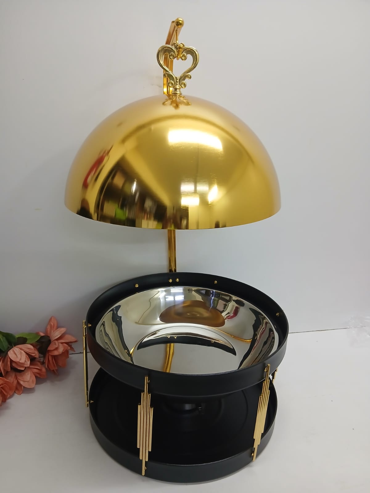 Golden fancy elegant chaffing dishes with hanging lid