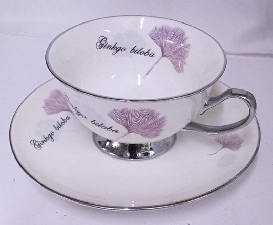 Cup and Saucer Pink Biloba With Stand