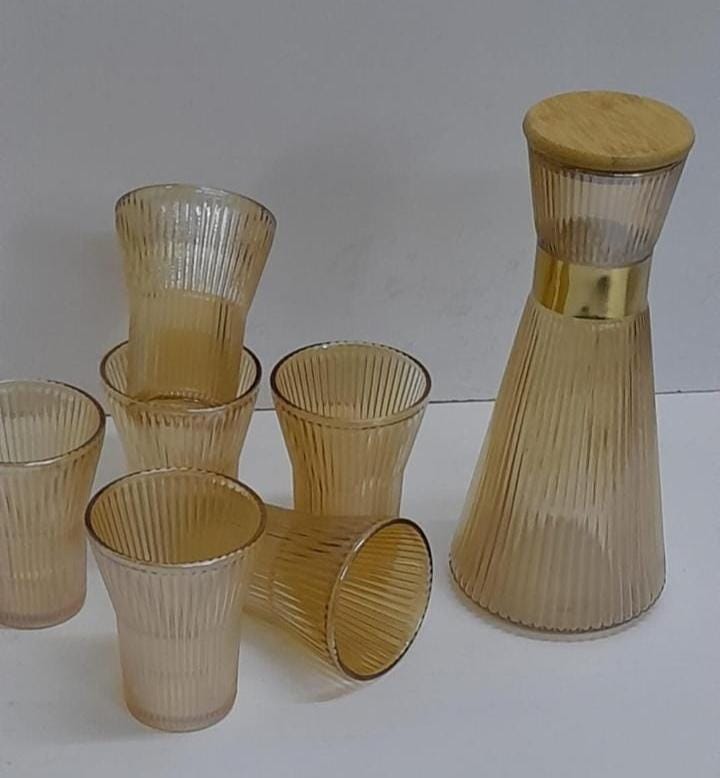 Glass carafe with glasses
