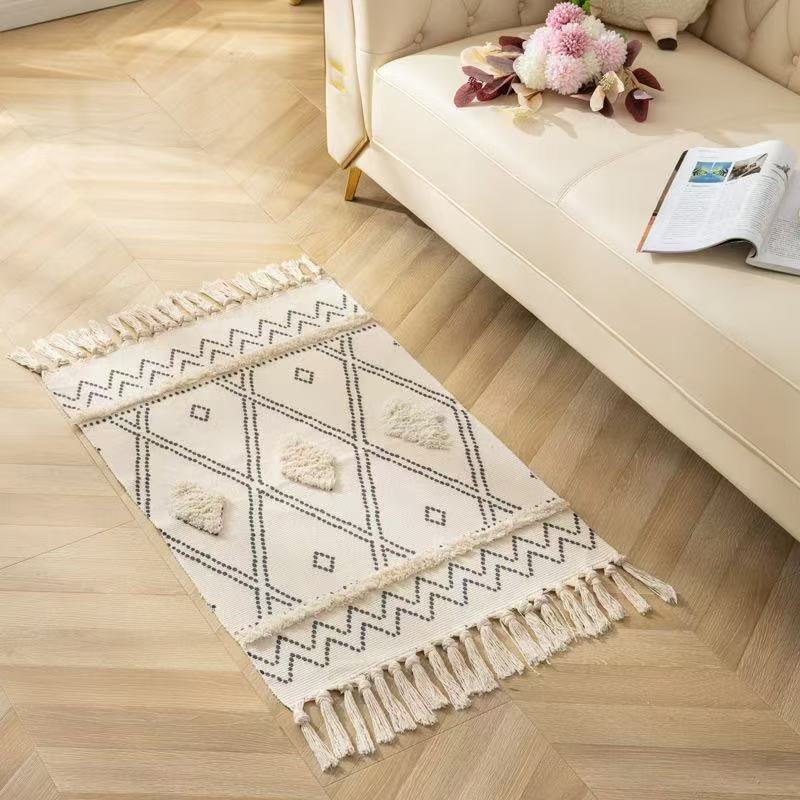 Bohemian Nordic style bedroom rug with tassels