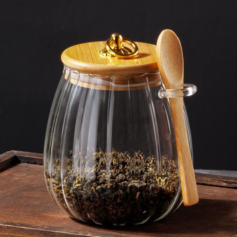 Ribbed glass storage jar