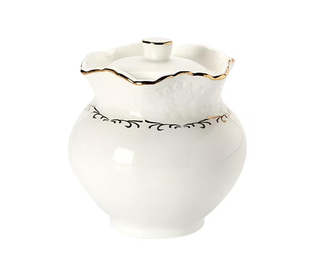 Gold rimmed sugar dish