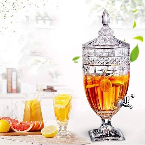 Cooling Spherical wine juice or liquid dispenser with ice slot and separator