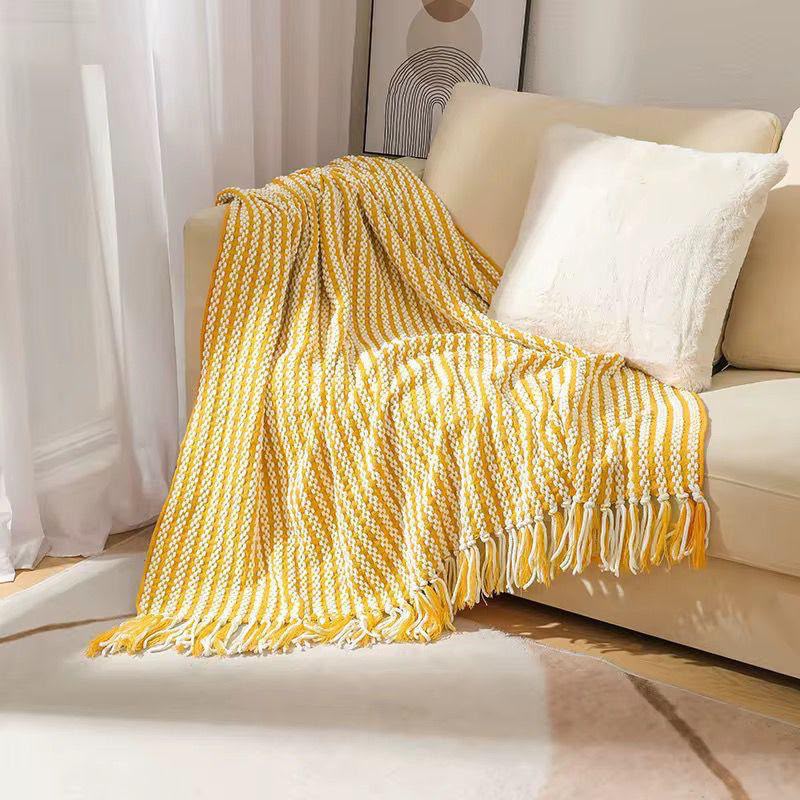 Textured knitted heavy throw blanket with tassels