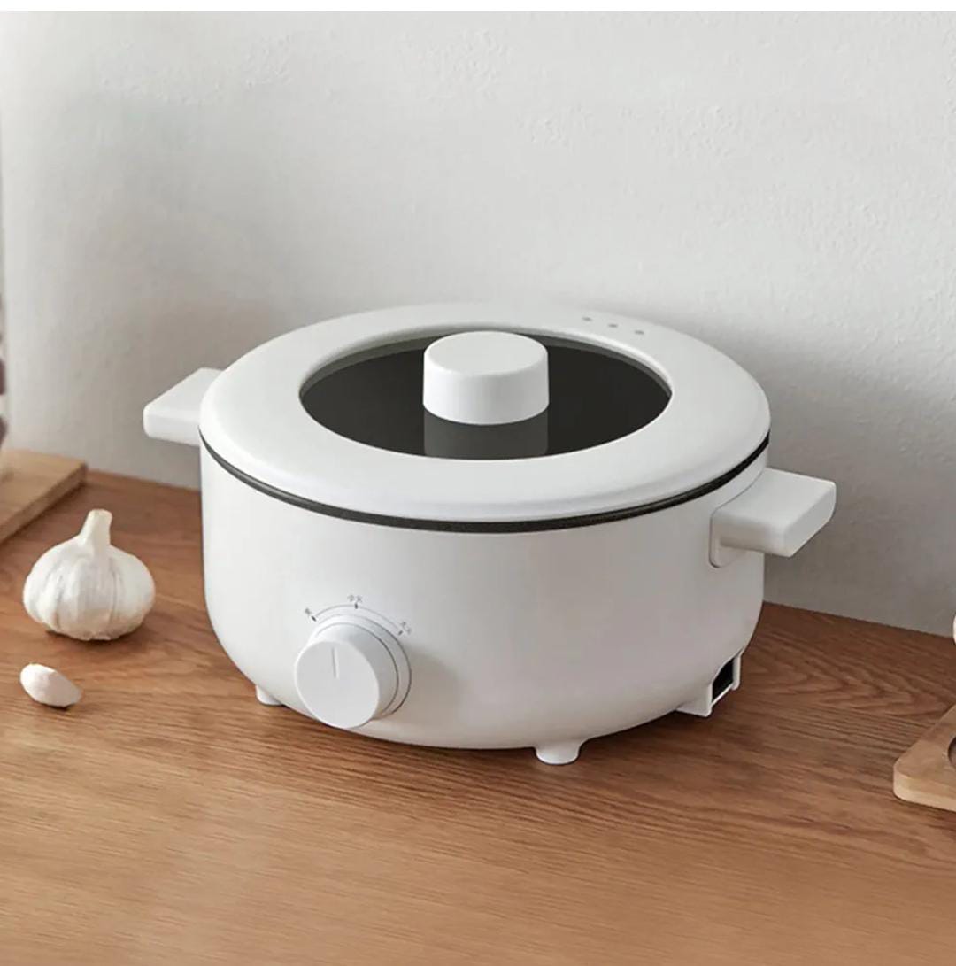 Multiple purposes electric cooker