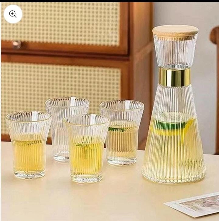 Glass carafe with glasses