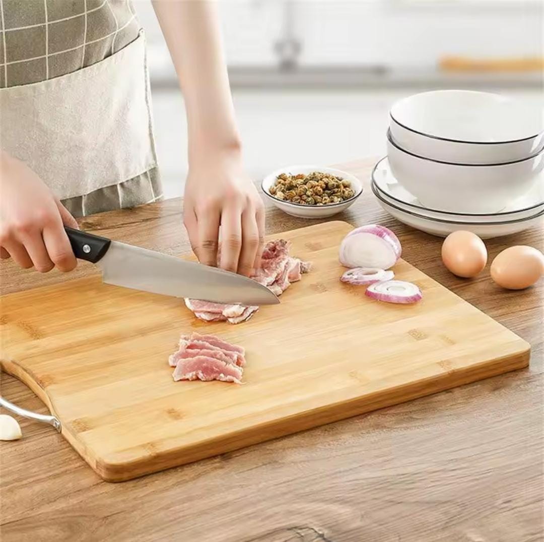 Heavy wooden chopping board with metallic handle