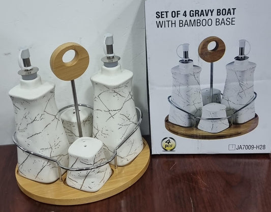 set of 4 ceramic gravy boat season oil dispenser and shakers on bamboo base