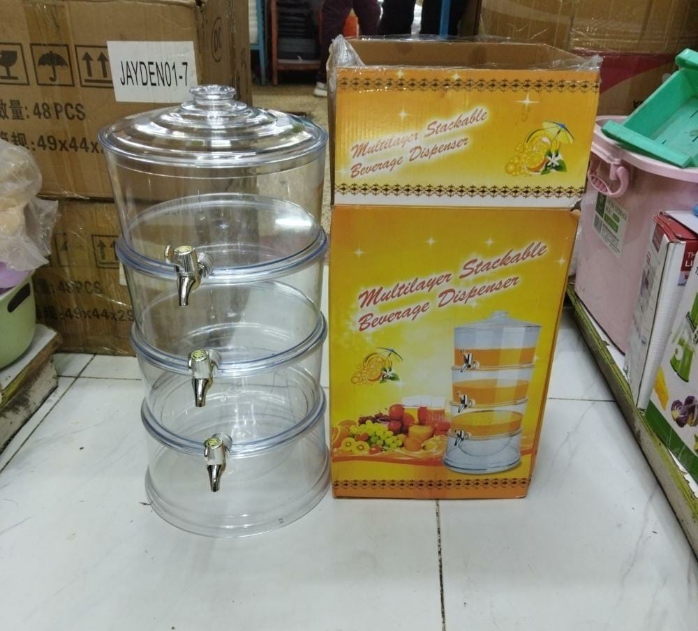 Juice/beverage dispenser with dispensing taps