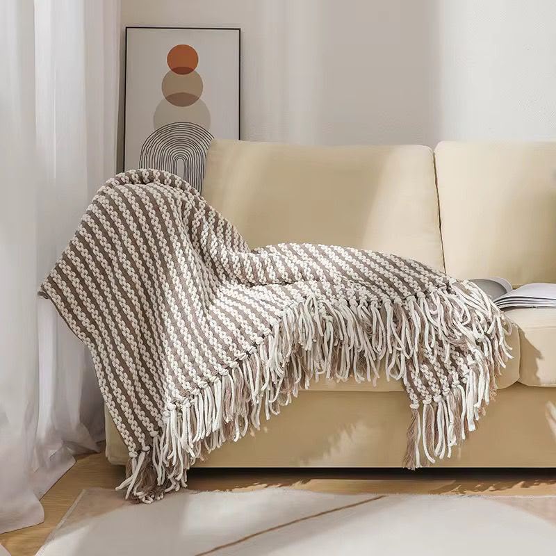 Textured knitted heavy throw blanket with tassels