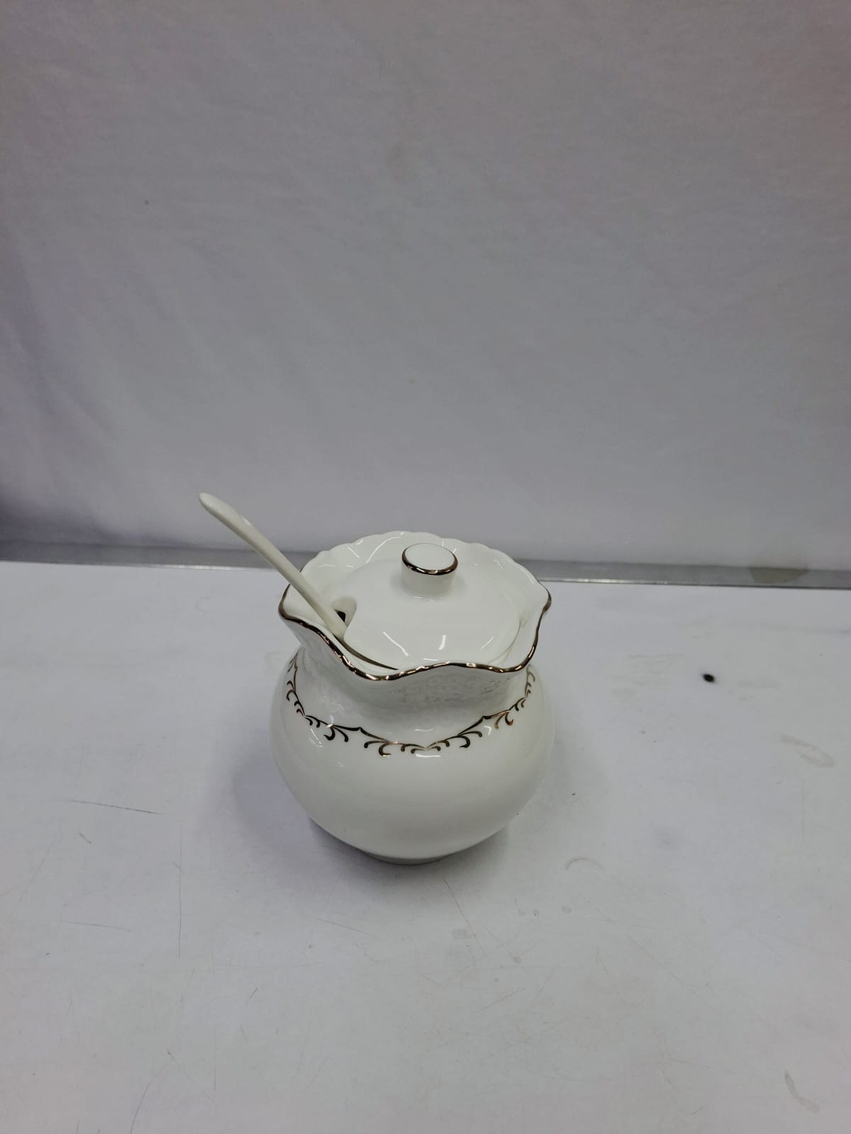 Gold rimmed sugar dish