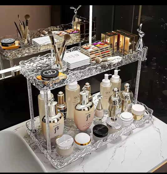 Two tier crystal-like makeup organizer.