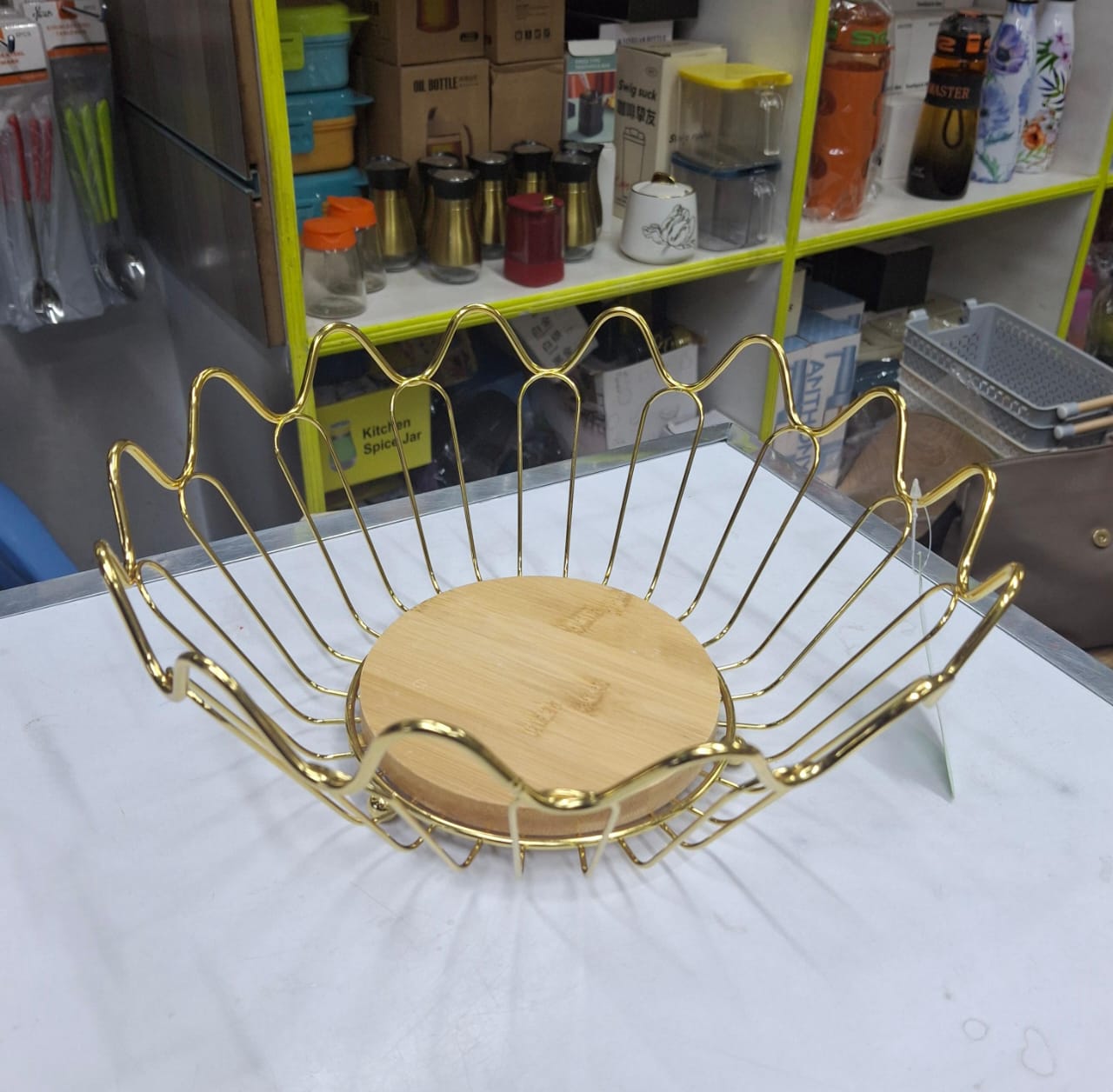 Wooden base gold fruit basket