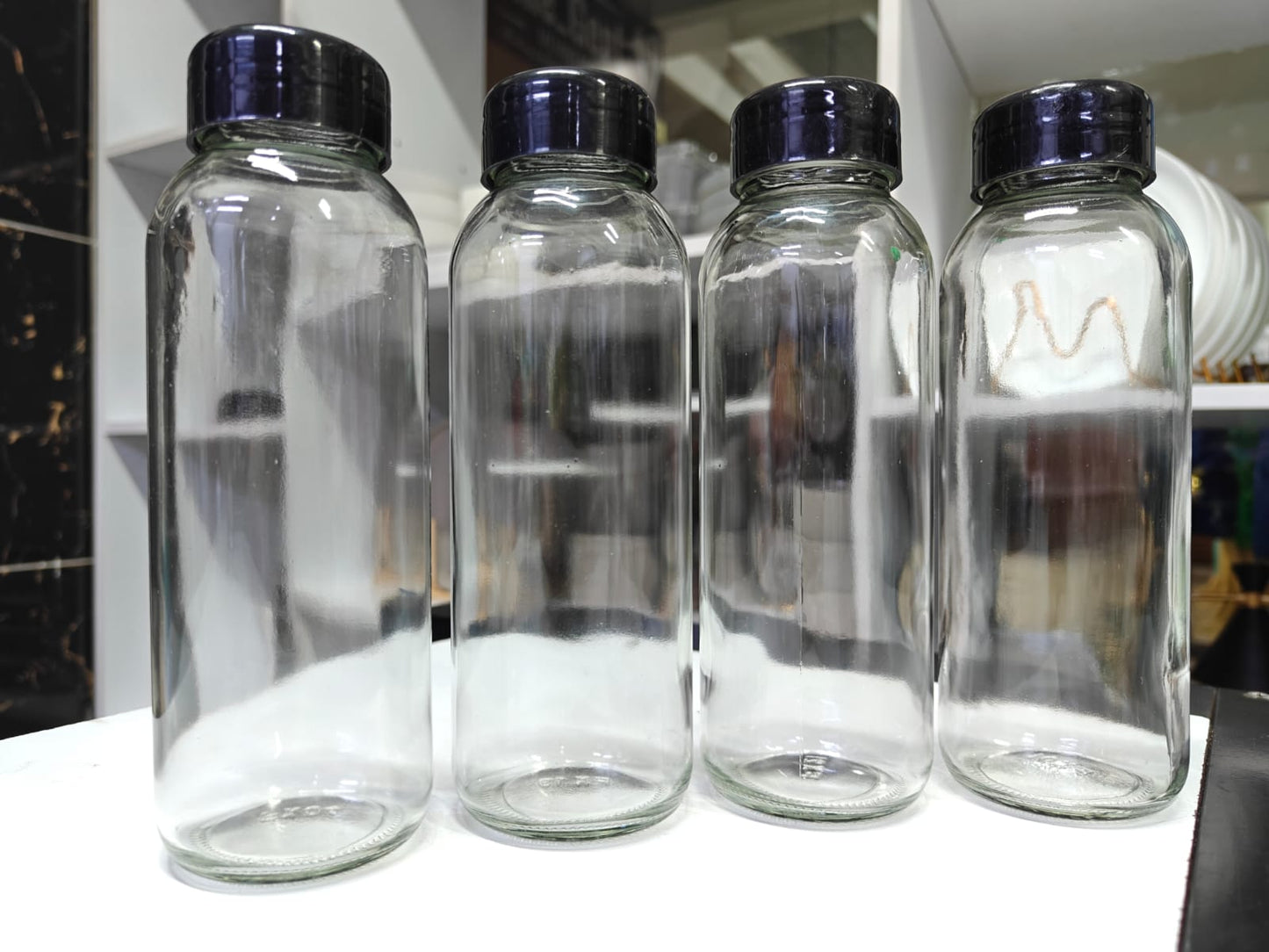 Re-usable glass juice bottles