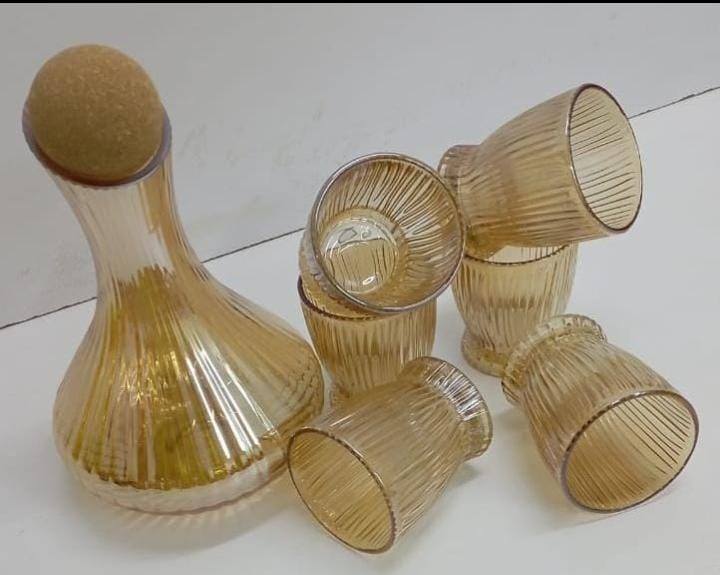 Glass carafe with glasses