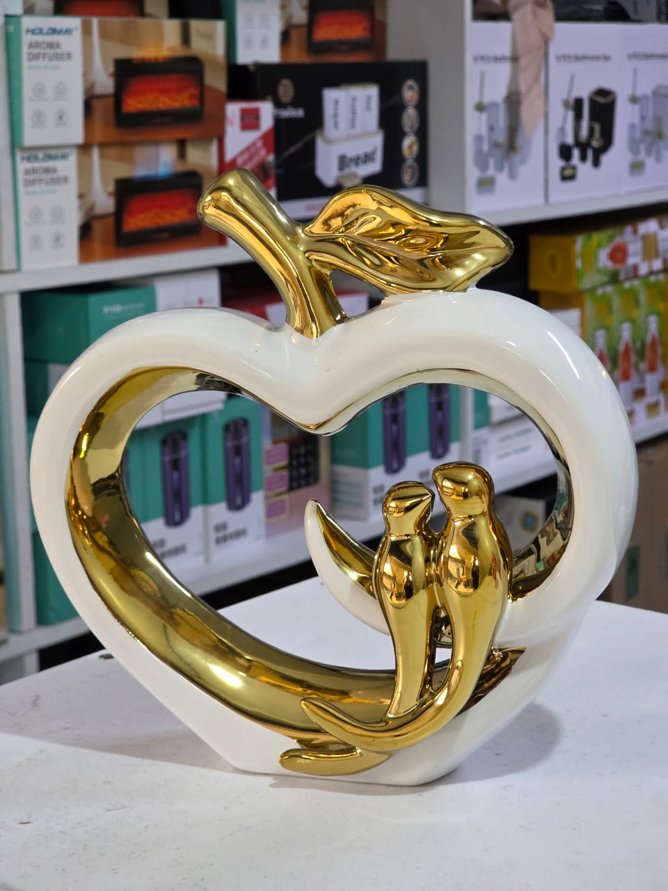 Ceramic hollow crafts Apple golden bird simulation